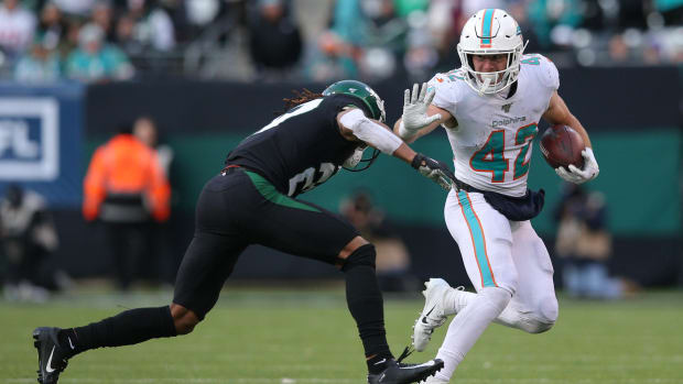 patrick-laird-dolphins-jets